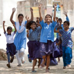 2011_08-Girls-running-i-India-Photo-credit-Graham-CrouchGirls-Not-Brides